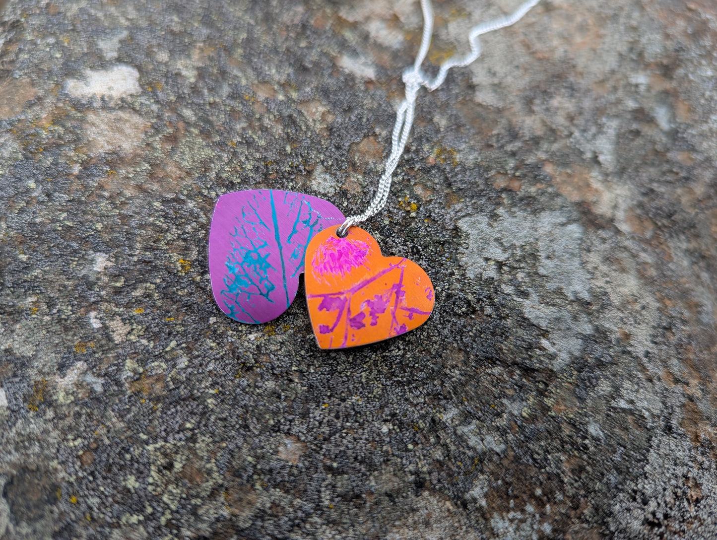Double layered purple and orange wildflower heart pendant